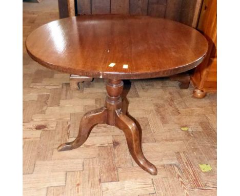 Geroge III mahogany tripod table, 63cm diameter. Condition report: see terms and conditions.