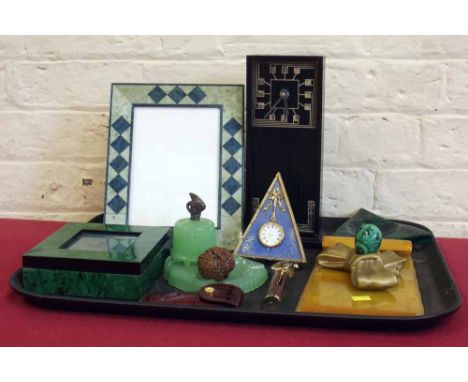 Carrick (Scotland) mantel clock, Kitney & Co. (London) mantel clock, Gucci corkscrew, Carvacraft stand etc. Condition report:
