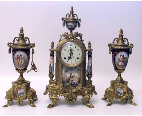 Gilt metal and porcelain three piece clock set. Condition report: see terms and conditions.