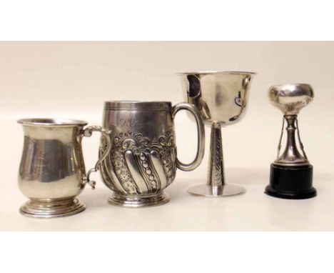 Two silver Christening mugs and two trophy cups. Condition report: see terms and conditions.