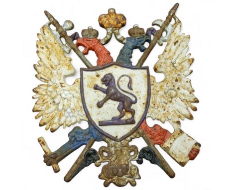 A 19th century cast iron polychrome painted armorial plaque depicting the coat of arms for Montenegro, 35cm x 31cm  Research 