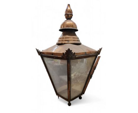 An early 20th century copper street lantern, W Windsor No 287 Hoddesden Herts,  bud finial, ball feet,  82cm high