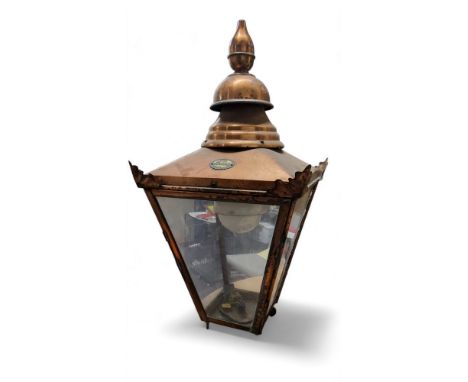 An early 20th century copper street lantern, W Windsor No 287 Hoddesden Herts,  bud finial, ball feet,  82cm high