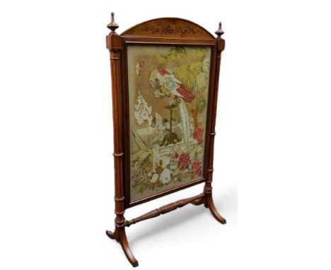 A substantial Victorian walnut country house needlework tapestry firescreen, turned stretcher, 140cm x 82cm