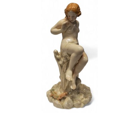 A rare 19th century Royal Worcester lustre figure, of a scantilly clad frightened lady, seated on a&nbsp;tree stump, a lizard