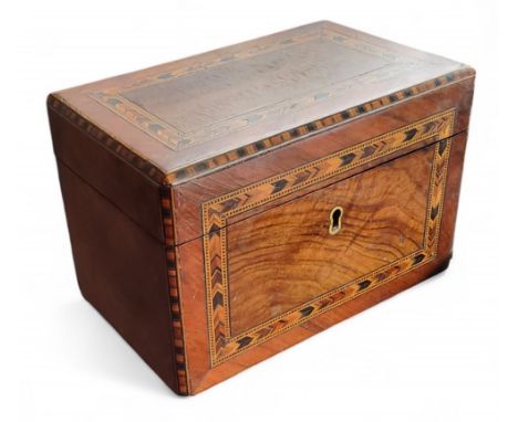 A Victorian walnut and parquetry tea caddy, feathered banding, 11.5cm high, 17cm wide, c.1870