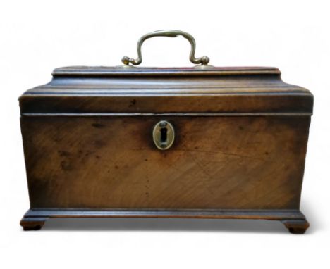 A George II mahogany tea caddy, pagoda top, swan neck handle, bracket feet, the interior with three sections, 16cm high, 26cm