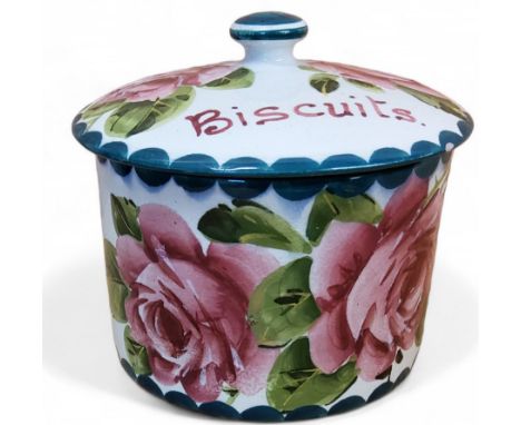 An early 20th century Wemyss cylindrical biscuit box and cover, painted cabbage roses and foliage, the lid  Biscuits, 12.5cm 