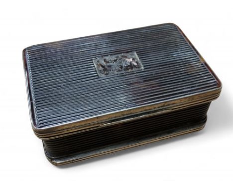 A George III rounded rectangular reeded tortoiseshell snuff box, silver coloured metal mounts and hinge, 2.5cm high, 7.5cm wi