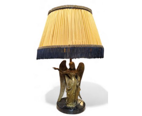 A French bronze figural table lamp, the cast bronze caryatid in the form of an angel, circular marble plinth base, with tassl