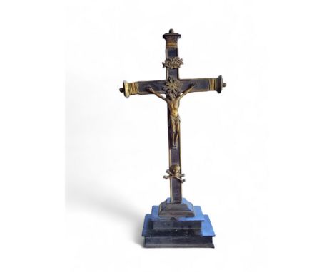 An 18th century North European bronze and ebony Corpus Christi, stepped base, 46cm high, c.1775