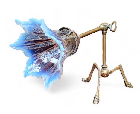 An Arts &amp; Crafts Benson type brass library lamp with vaseline glass shade, terminating on hoof feet c.1910