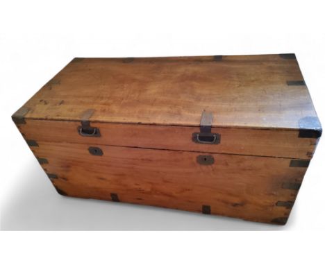 An early 20th century brass bound mahogany 'campaign' trunk, brass handles, the pine interior with candle box, 49cm high, 104