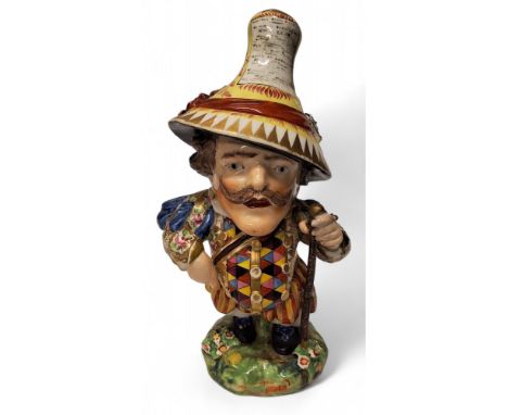 An 18th century&nbsp; Derby Mansion Dwarf, modelled in flamboyant 17th century cavalier costume with long moustache and tall 