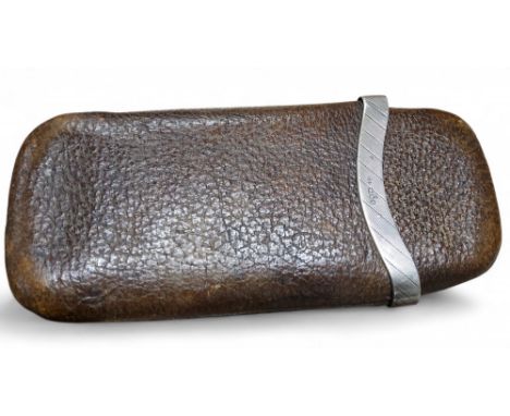 A silver mounted and leather rounded rectangular cigar case, engine turned, 24cm long, G H James &amp; Co (George Henry James