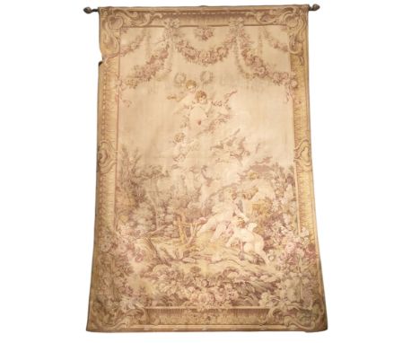 A French Aubusson type tapestry depicting ribbon tied floral swags and putti amongst the clouds above further cherubs in a wo