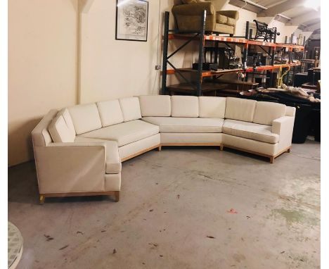 A large bespoke modular sofa in two identical parts designed and custom made by Decca in conjunction with Bolier in a cream l