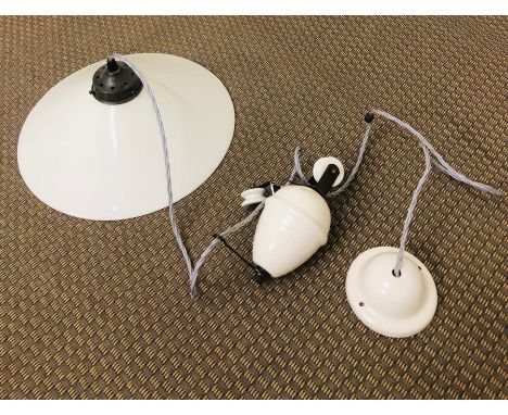 A cream porcelain pendant light with celling fixture 