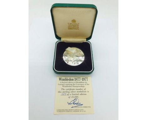 A Limited Edition Medallion by Garrard in Sterling Silver celebrating the Centenary of the Wimbledon Championships 1877 - 197