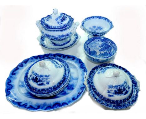 A STAFFORDSHIRE FLOW BLUE EARTHENWARE DINNER SERVICE, LATE 19TH CENTURY AND A COPELAND BLUE PRINTED EARTHENWARE SPODE ITALIAN