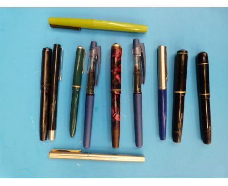 A collection of vintage fountain pens including Parker, Osmir etc 
