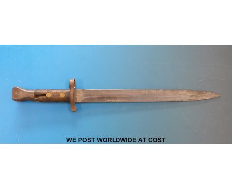 A Wilkinson bayonet marked 9 96 and with WD marks.