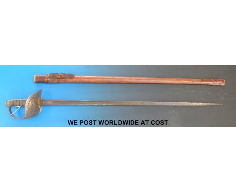 An 1897 pattern sword in leather scabbard, possibly by Mole.  Impressed no: 4723 to blade.