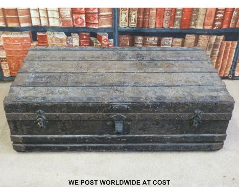 An ash and metal bound steamer trunk 