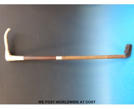 A Swaine & Co. hallmarked silver mounted hunting or riding crop.