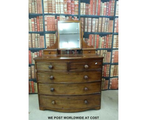 A 19thC mahogany bow fronted dressing chest of two over three graduated drawers (W103 x D52 x H148cm)
