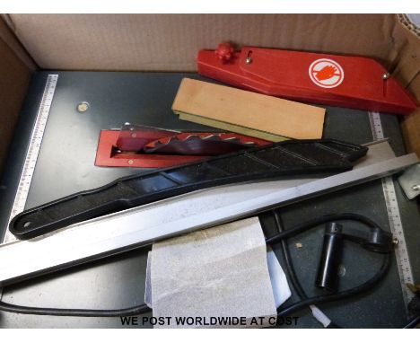 A boxed bench saw together with a sander 