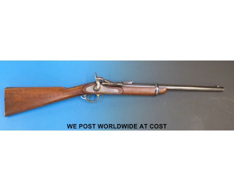 An Enfield .577 hammer action saddle carbine rifle with signed Snider patent action, five groove rifling, ladder back sight, 