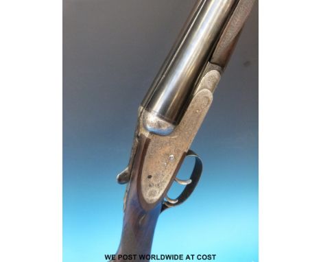 Trulock Brothers 12 bore side by side shotgun with all over ornate engraving of partridge and snipe to the side locks and a s