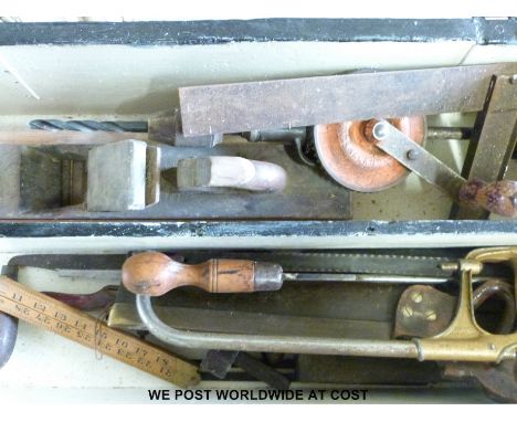 A vintage pine tool chest with fitted trays together with a large quantity of various tool, some named, including planes, saw