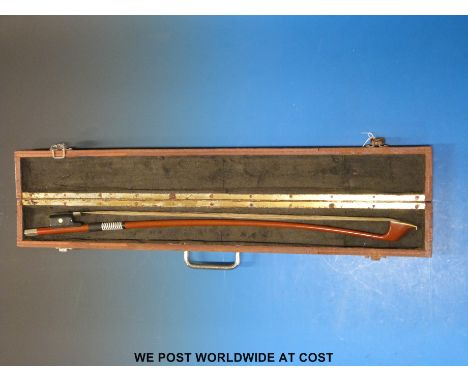 A cased cello bow with ivory mounts, indistinctly signed with initials F.H  London. 