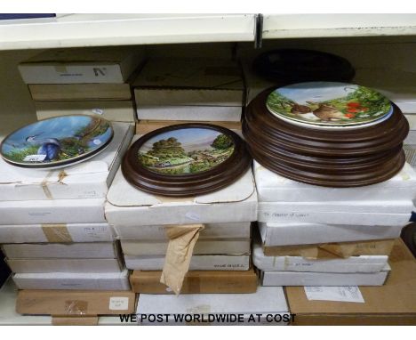 A very large quantity of collectors plates and cups by Spode, Royal Worcester, Doulton etc.