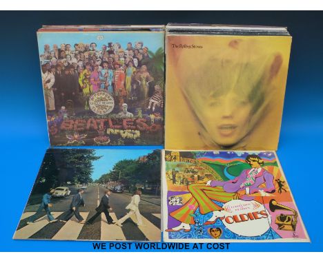 A collection of 30x LPs to include: The Rolling Stones “Goat's Head Soup” (complete); The Beatles (x6) “Revolver”, “Sgt Peppe