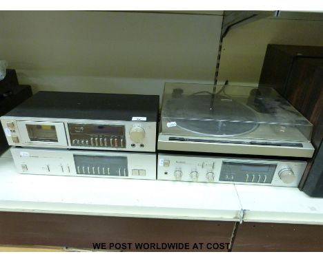 Pioneer separates stereo system in boxes, comprising CS-767 speakers, PL-720 turntable CT-520 tape decks, TX-720 tuner and SA