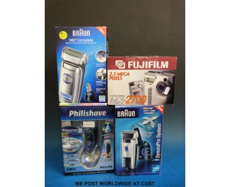 A boxed Braun 360° complete electric razor, a further Braun electric razor, Philishave example and Fujifilm MX-700 digital ca