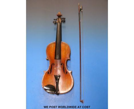 A late 19thC / early 20thC violin (label not legible) impressed Dresden to the 35.8cm two piece back with bow and case.