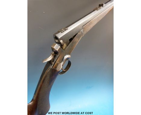A Holland & Holland .295 "semi-smooth bore" hammerless rook rifle converted to a .410 shotgun. Top lever, non selective eject