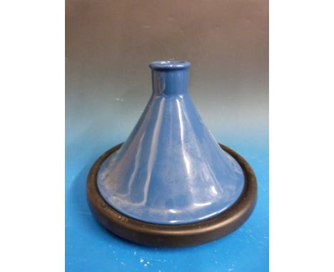 A Le Creuset cast iron and ceramic tagine/steamer.