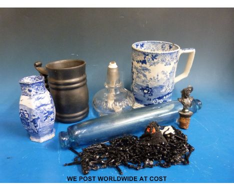 A blue glass rolling pin, a large spirit lamp, a Prinknash tankard, bottle top metal lady, blue and white Staffordshire etc a