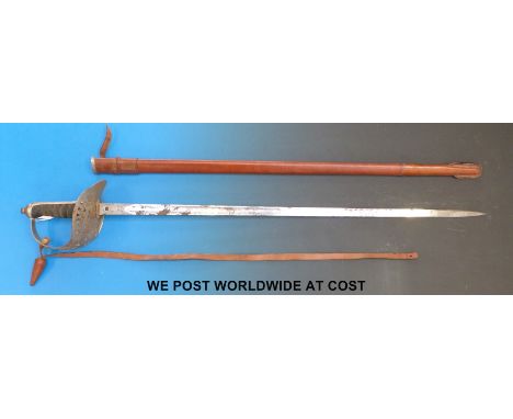 A replica 1897 pattern infantry sword in scabbard with 'Manton & Co, Calcutta, London Made' to blade. 