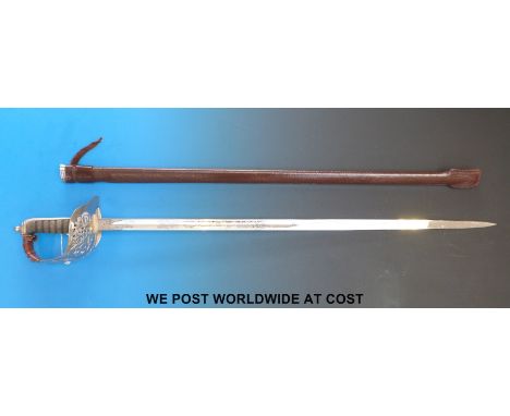 A QEII infantry officer's dress sword in scabbard.