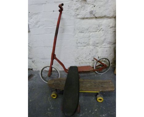 A vintage scooter and two vintage skate boards 