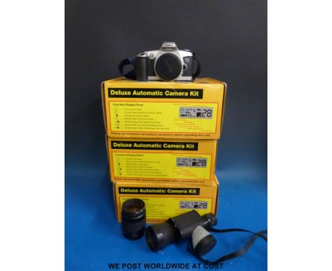 A Canon EOS 500 and 28 - 80 mm lens, three boxed Olympia camera kits in unused condition etc