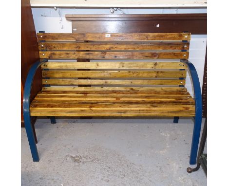 A pine slatted and wrought-iron garden bench, L120cm, H84cm, D56cm 