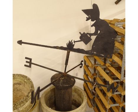 A wrought-iron weather vane 