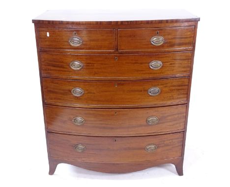 A Regency mahogany bow-front chest, with 2 short and 4 long drawers, on bracket feet, W105cm, H119cm, D54cm 